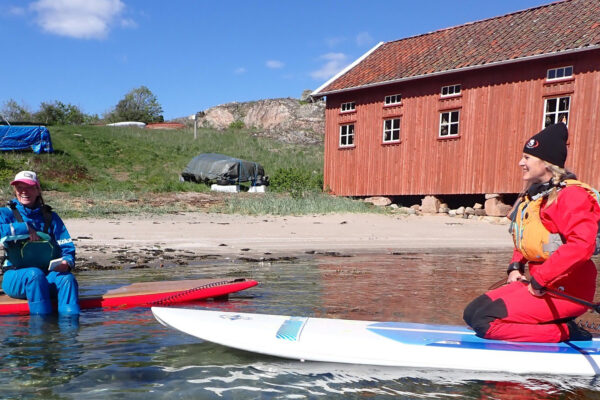 SUP-paddlare Grönemad solsken